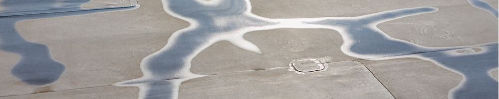 Water blijft staan op plat dak